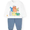 Set di maglietta e pantaloni in maglia per neonato di colore bianco.