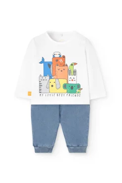 Set di maglietta e pantaloni in maglia per neonato di colore bianco.
