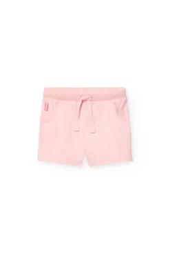 Set di maglietta e pantaloncini in maglia per neonata nei colori blu navy e rosa.