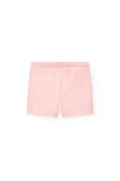 Set di maglietta e pantaloncini in maglia per neonata nei colori blu navy e rosa.