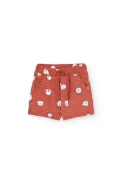 Set di t-shirt e pantaloncini in maglia per neonato bianco con motivo di leone.