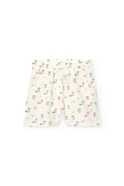 Short in batista per bambina con stampa tropicale in colore chiaro.