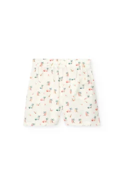 Short in batista per bambina con stampa tropicale in colore chiaro.