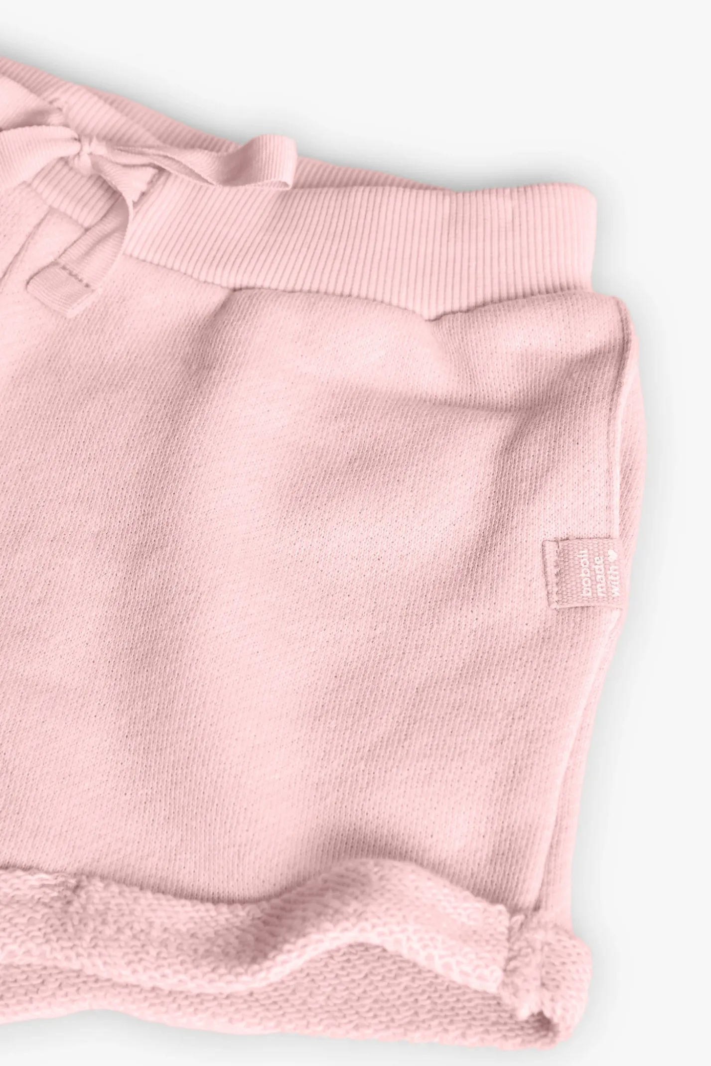 Short in felpa per bambina di colore rosa.