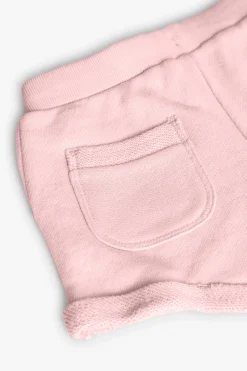 Short in felpa per bambina di colore rosa.
