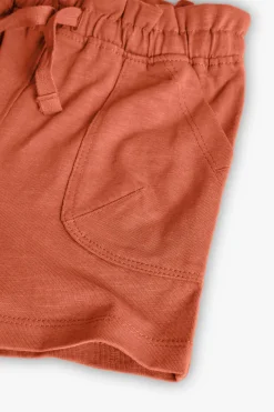 Short in maglia per bambina in colore arancione