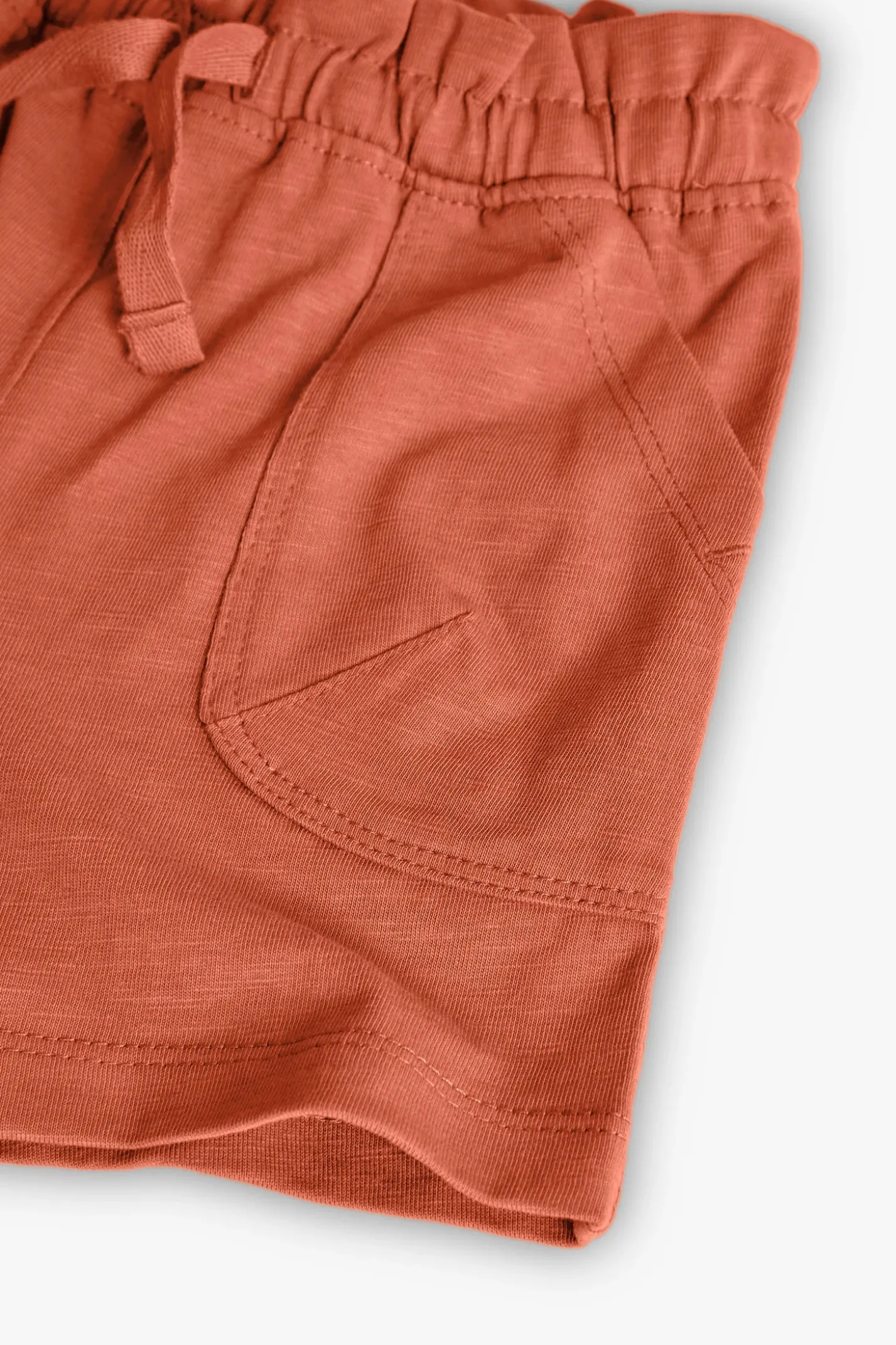 Short in maglia per bambina in colore arancione