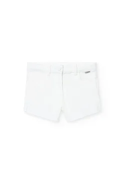 Short in tessuto di cotone elasticizzato per bambina di colore bianco.