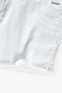 Short in tessuto di cotone elasticizzato per bambina di colore bianco.