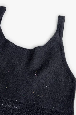 Top a maglia per bambina in colore blu marino.