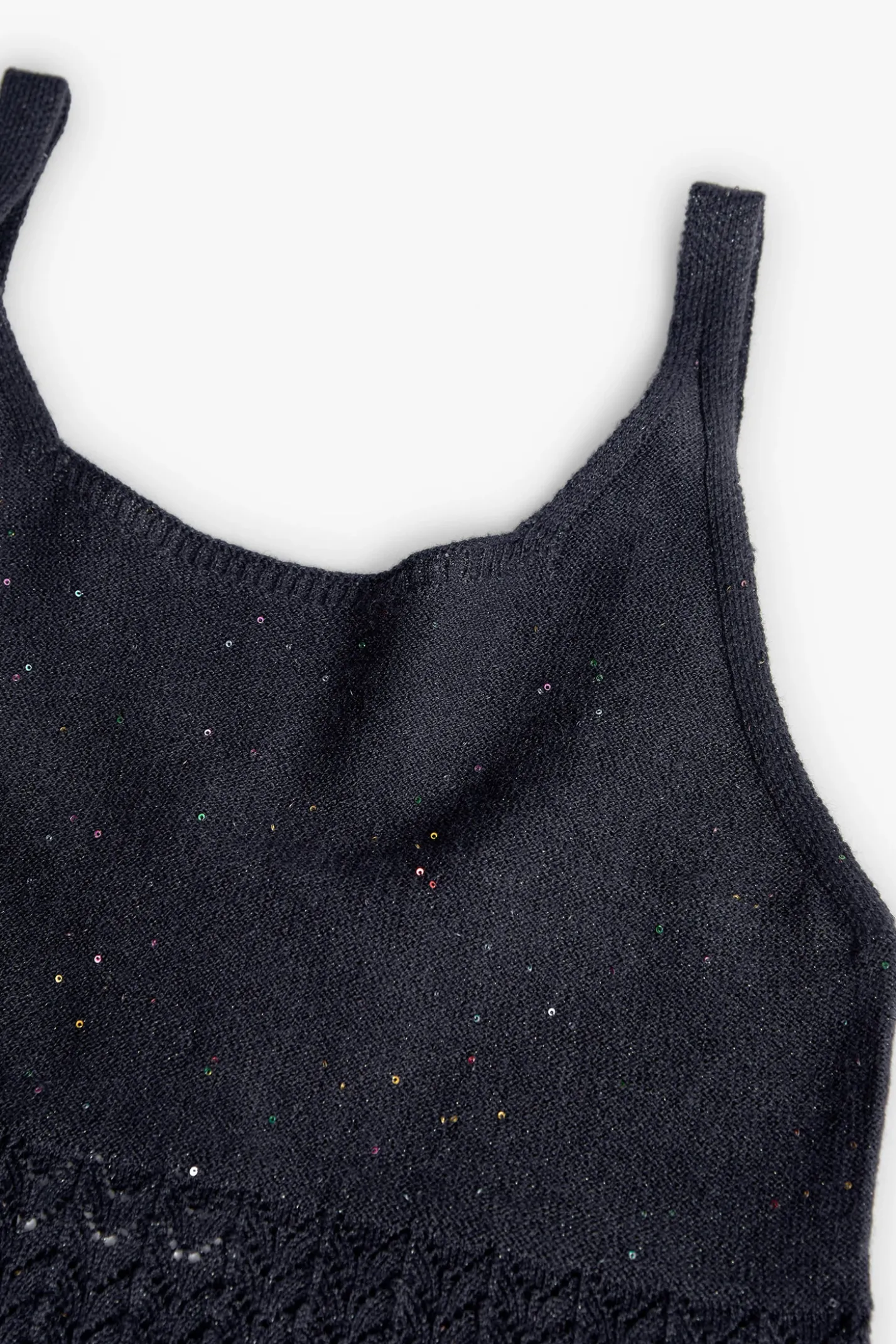 Top a maglia per bambina in colore blu marino.