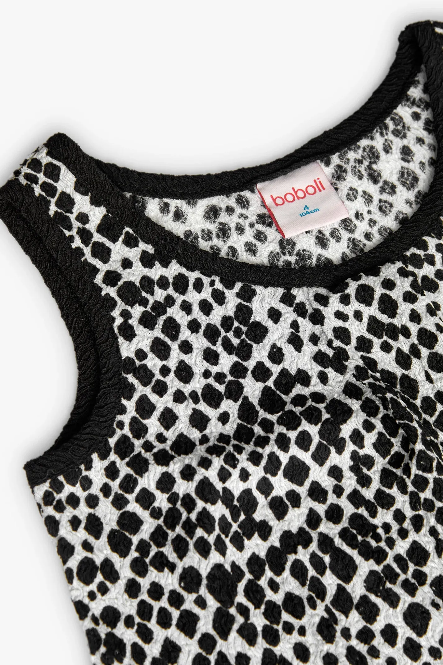 Top in crêpe per bambina con stampa in nero e bianco.