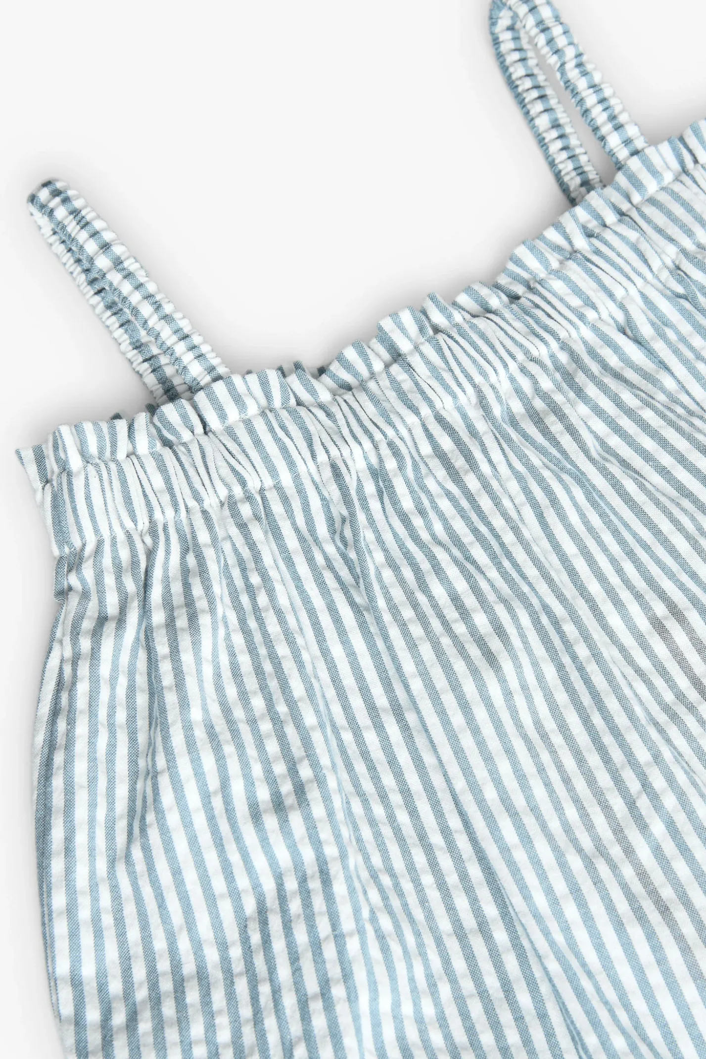 Top in popeline per bambina a righe blu e bianche.