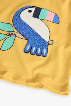T-shirt in maglia per neonato in giallo con stampa di tucano