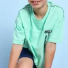 T-shirt per bambino in maglia di colore verde acqua