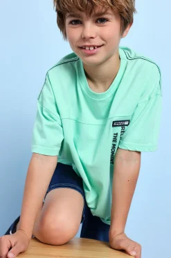 T-shirt per bambino in maglia di colore verde acqua