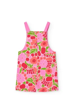 Tuta in maglia per bambina con design floreale in rosa e verde.