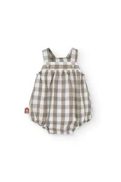 Tutina in maglia per bebé a quadri nei toni della terra.