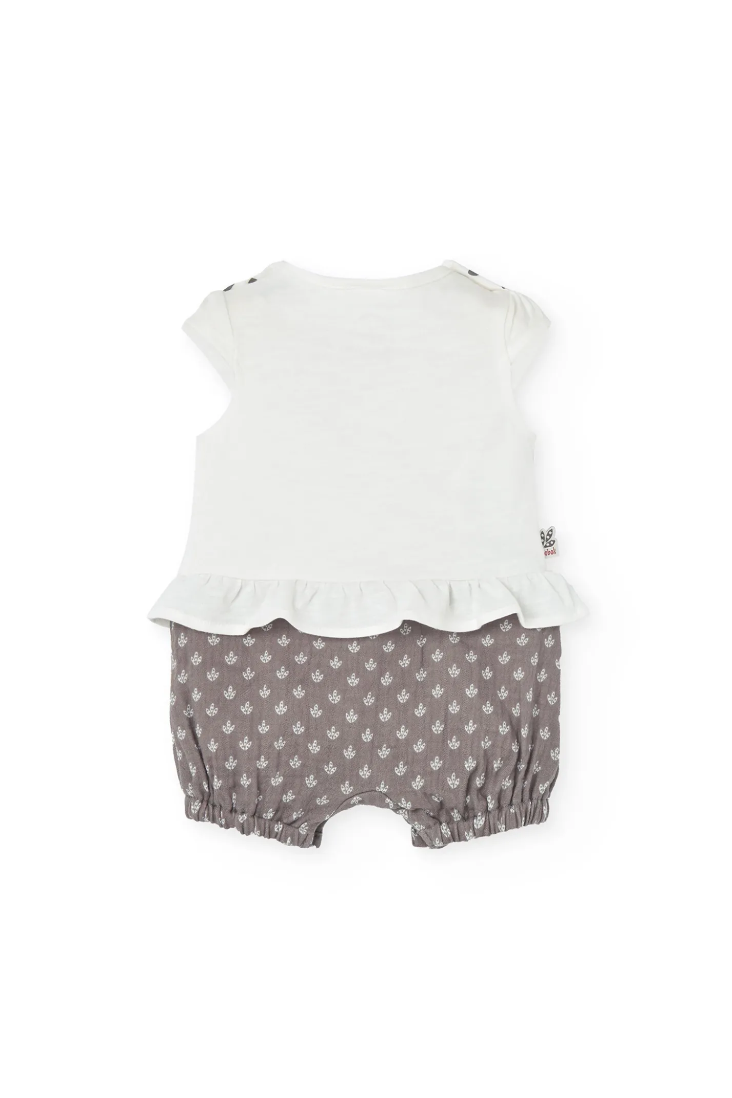 Tutina in maglia per neonata in bianco combinato