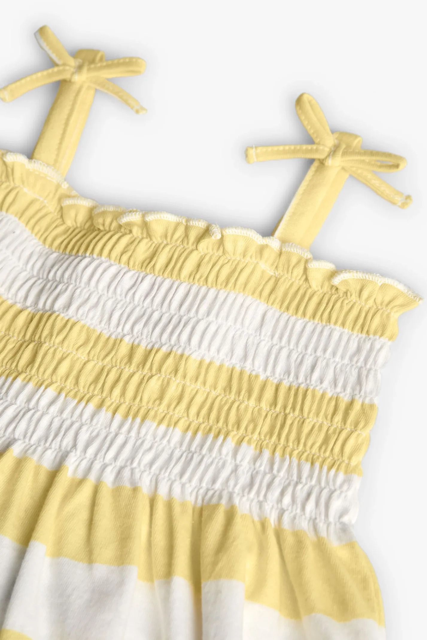 Vestito a maglia per neonata a righe in colore giallo e bianco