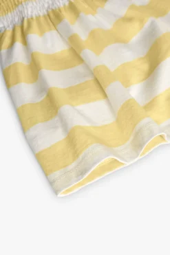Vestito a maglia per neonata a righe in colore giallo e bianco