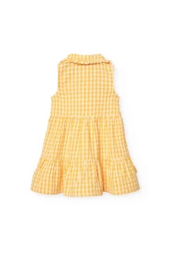 Vestito di popeline per neonata con stampa a quadri di colore giallo.