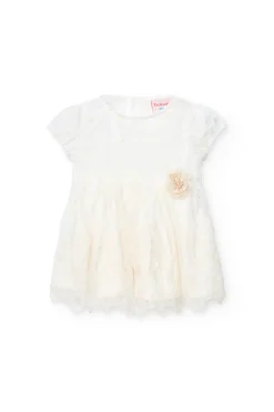 Vestito di tulle per bambina ricamato in colore bianco.