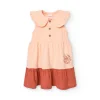 Vestito in maglia per bambina colore salmone con design fiammato.