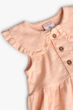Vestito in maglia per bambina colore salmone con design fiammato.