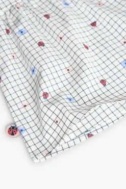 Vestito in popeline per neonata con stampa in bianco e blu